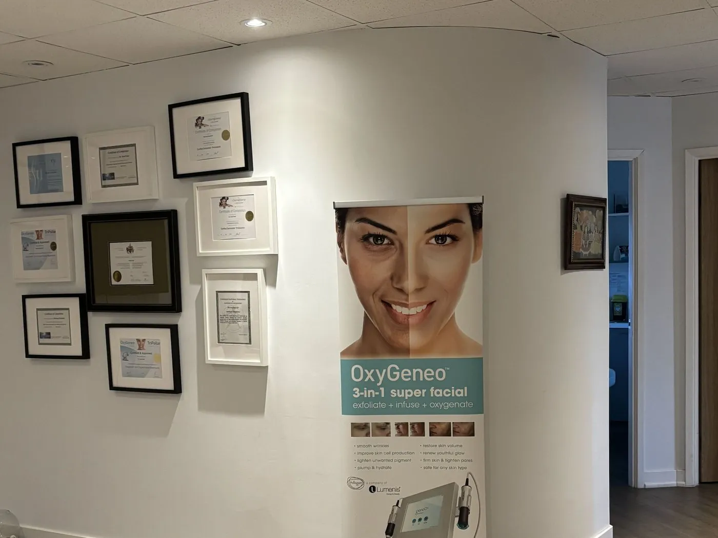 The certificate wall and OxyGeneo banner inside our Thornhill clinic